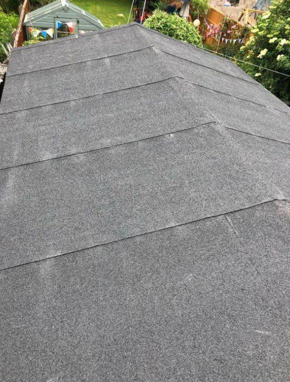 Picture of a shallow pitch roof replaced in felt by Roofers Leeds