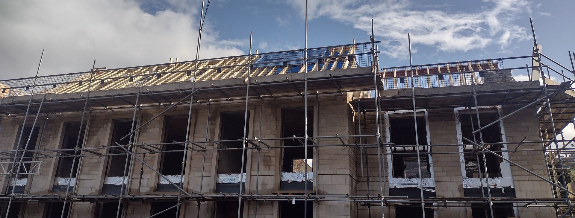 Pitched roof construction on a property at Thilmere Gardens Leeds by KMC Roofers Leeds