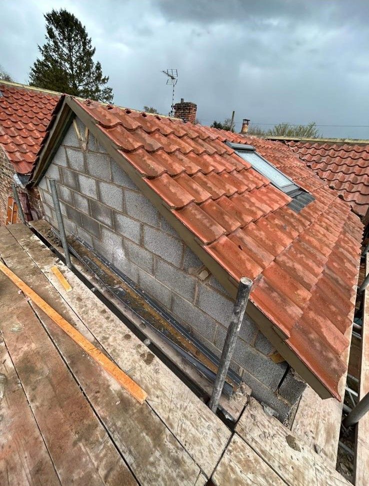 Roofers Leeds - replacement of clay tiles on a gable roof
