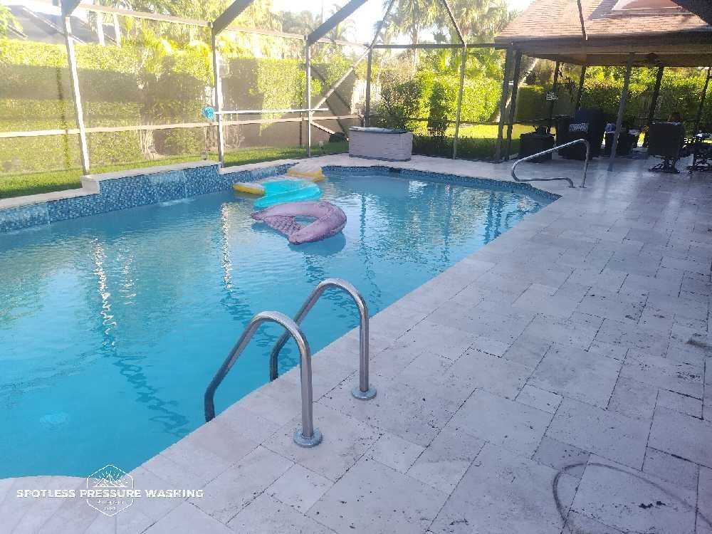 A swimming pool with a pink float in it