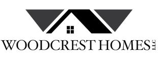A black and white logo for woodcrest homes.