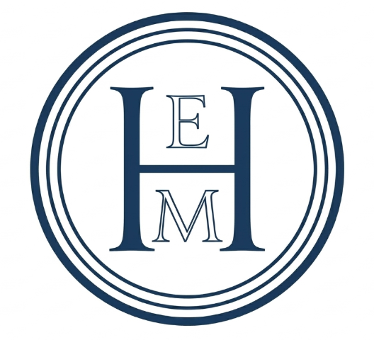 Elton M Hyder Foundation logo with overlapping orange, navy, and yellow mountain lines