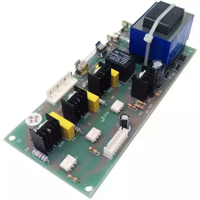 Electronic circuit board with a large blue transformer and black components on a white background