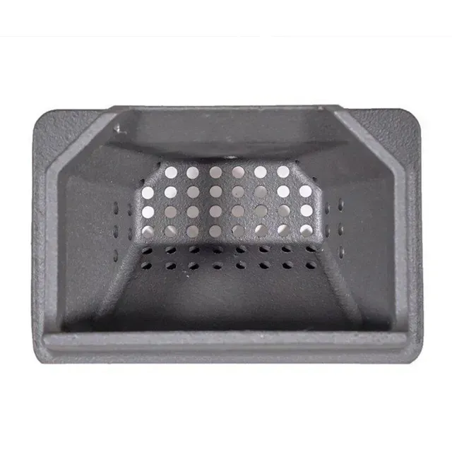 Gray perforated metal vent cover with a rectangular opening and angled sides