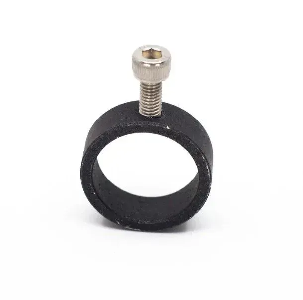 Black ring clamp with silver screw on a white background