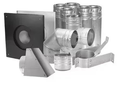 Assorted silver HVAC duct fittings and black vent cover on a white background