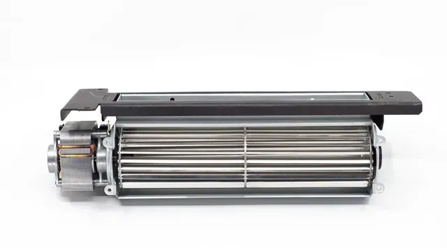 Industrial electric fan blower motor with cylindrical metal housing and attached top mount