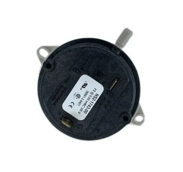 Black round electronic component with a white label and metal mounting tabs on a white background