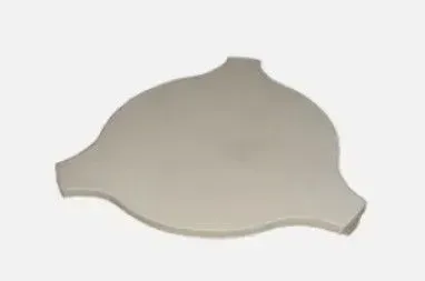 Beige, irregularly shaped plastic lid or cover on a white background