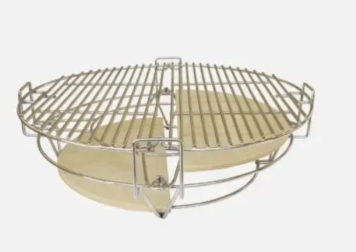 Round metal grill or rack with wire top and beige base on a white background