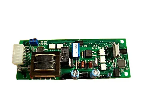 Small green printed circuit board with white connectors, capacitors, and metal components