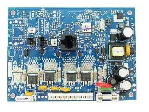 Blue electronic circuit board with chips, connectors, capacitors, and a white ribbon connector