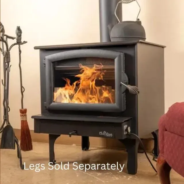 Black wood-burning stove with fire inside and text “Legs Sold Separately” underneath.