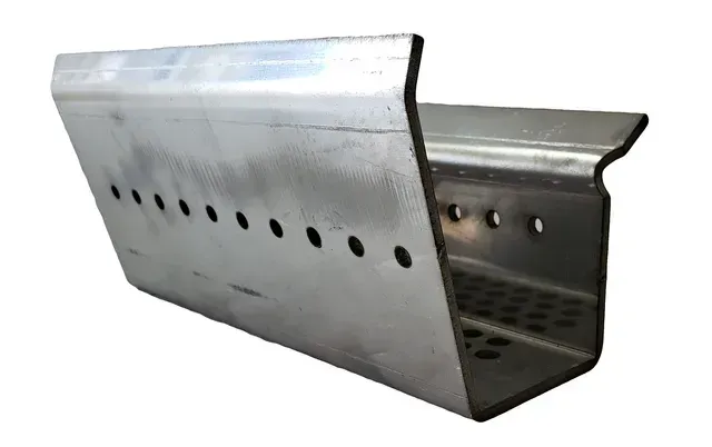 Metal sheet-bending brake tool with perforated sides, shown on a white background