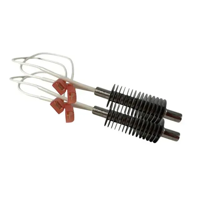 Set of metal grill tools with wire handles and black heat-resistant grips