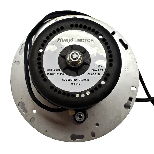Circular blower motor with black center housing on a silver metal mounting plate