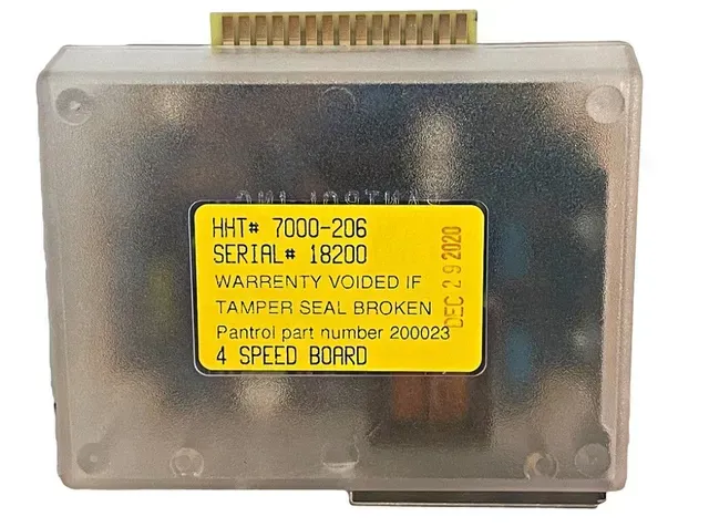 Transparent electronic module with yellow warning label and metal connector on top