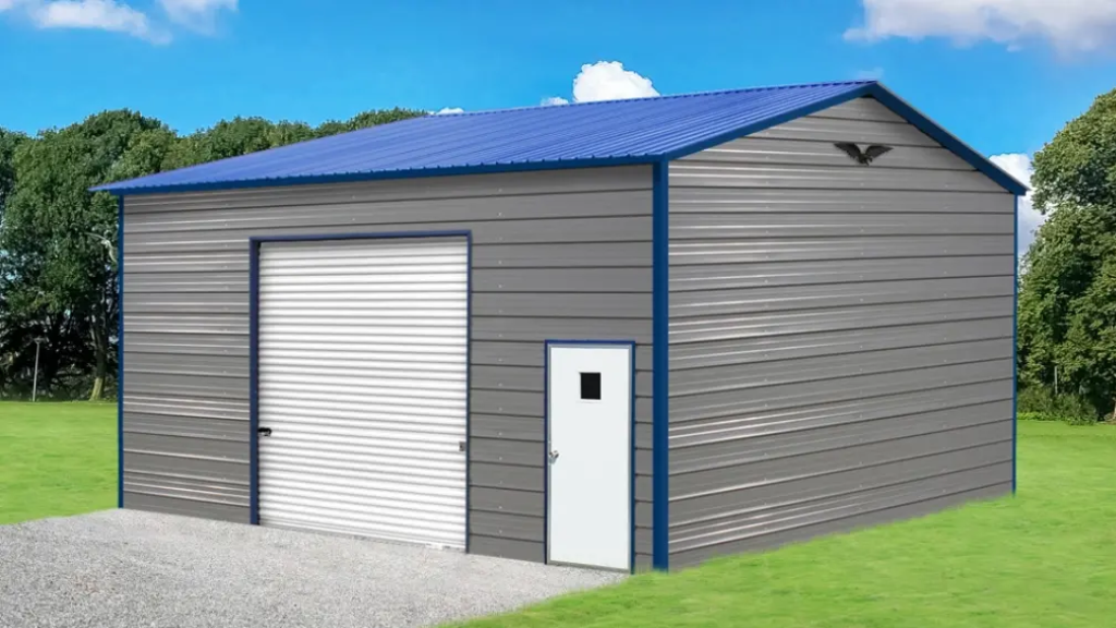 Tan and brown metal garage with two roll-up doors and windows, on a concrete pad.