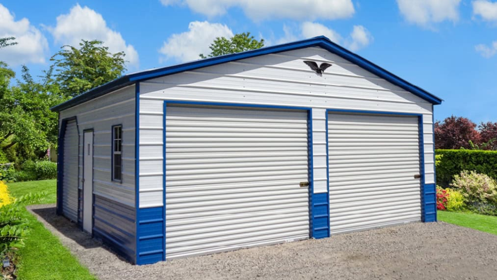 Tan and brown metal garage with an open door and fence.