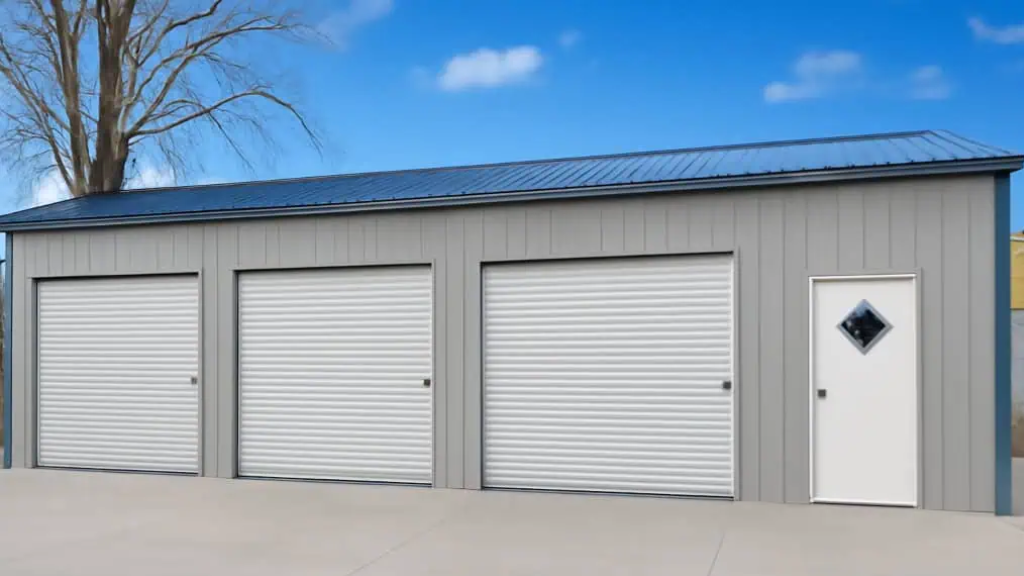 Tan metal garage with white door and open bay, set on grass.