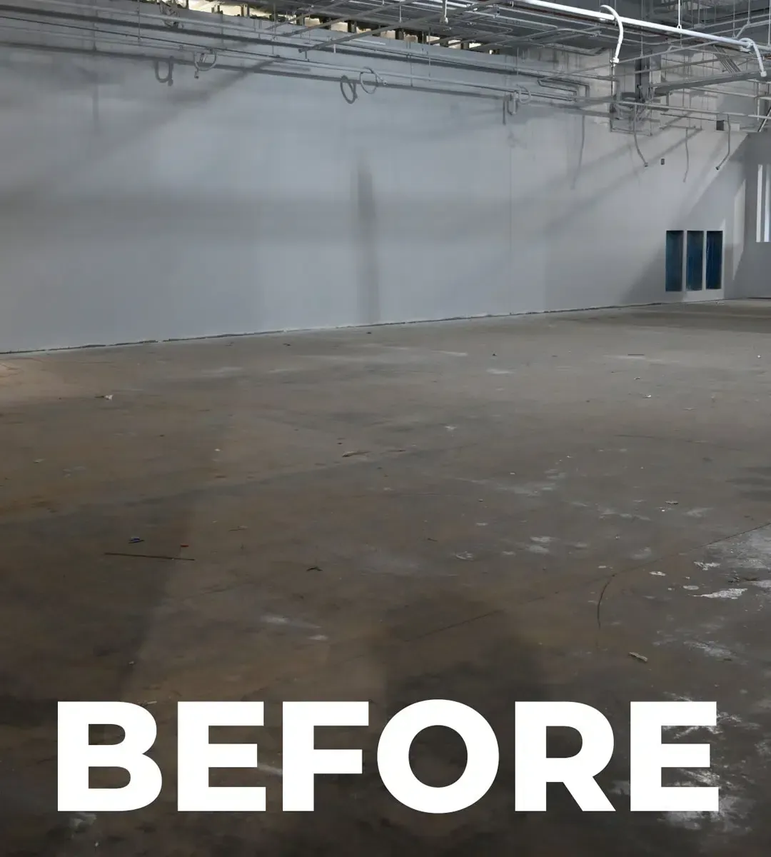 Empty industrial room with concrete floor and white walls, labeled “BEFORE” at the bottom.