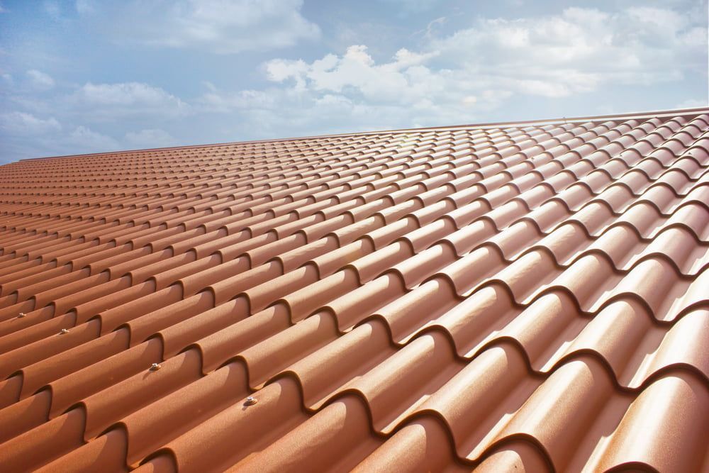 Insulated maroon roofing — Elliott Timber Sales Pty Ltd in Ryan, QLD