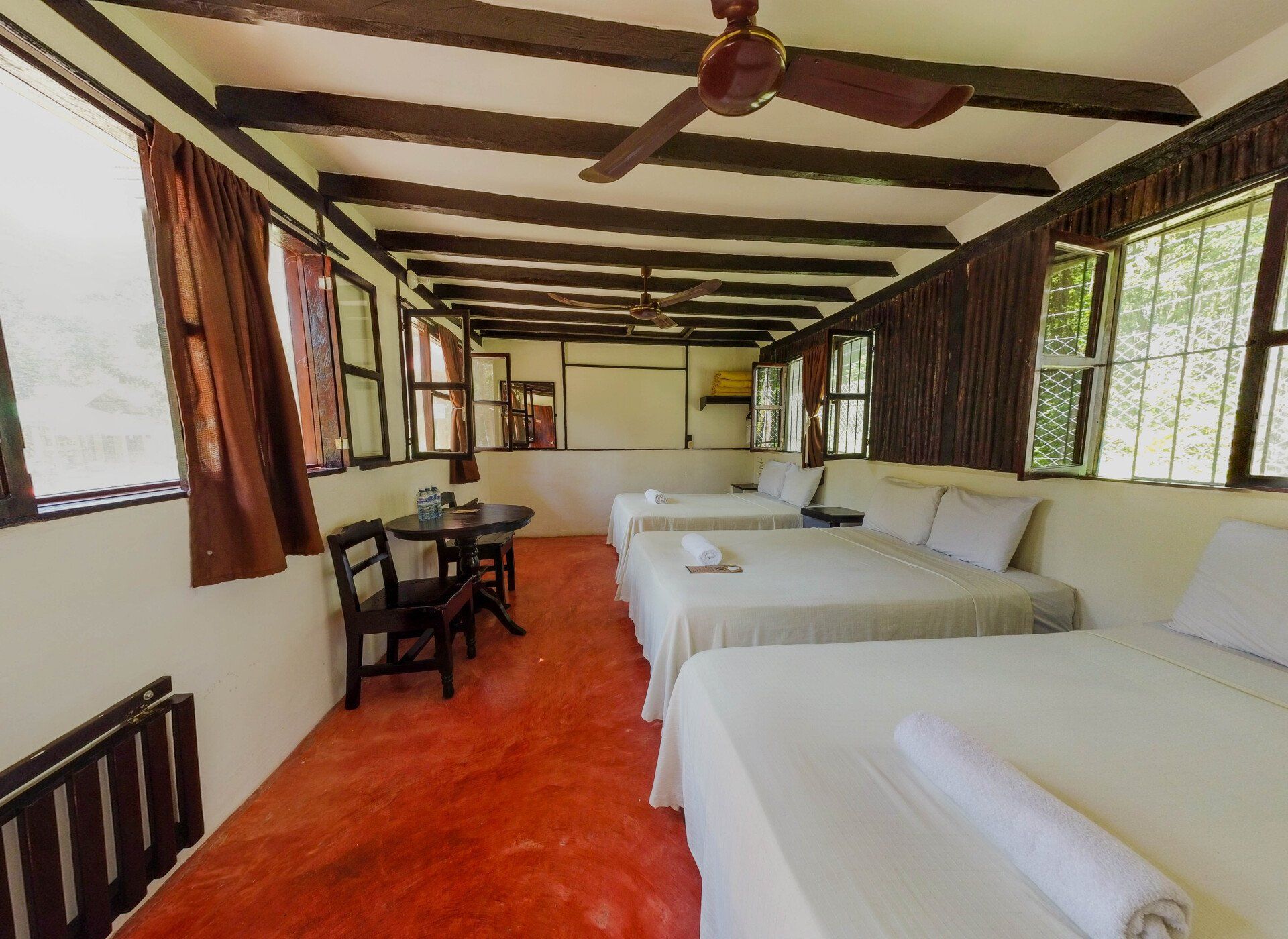 Camas de la cabaña familiar privada en Kin Balam