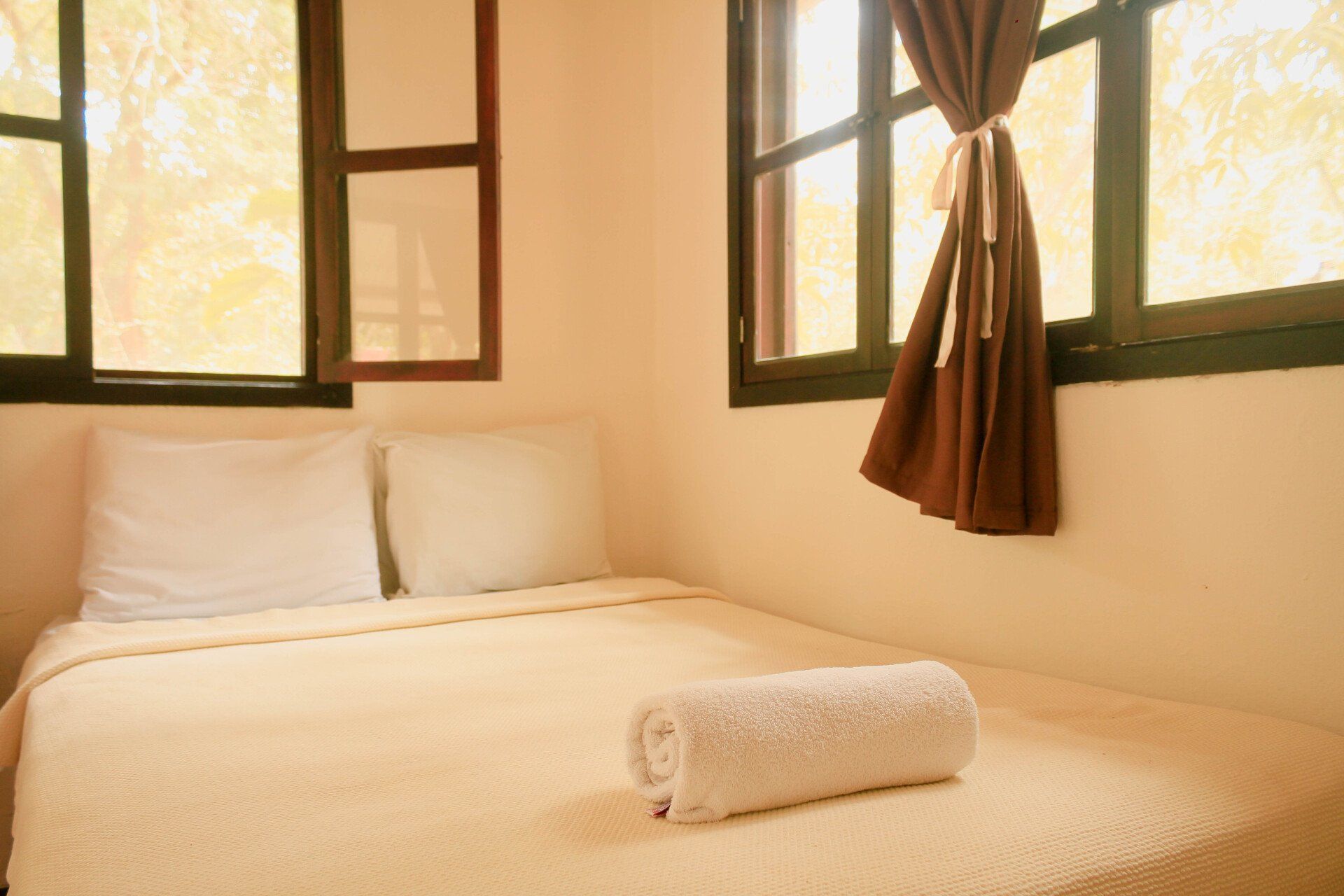 Cama doble del Hotel Kin Balam