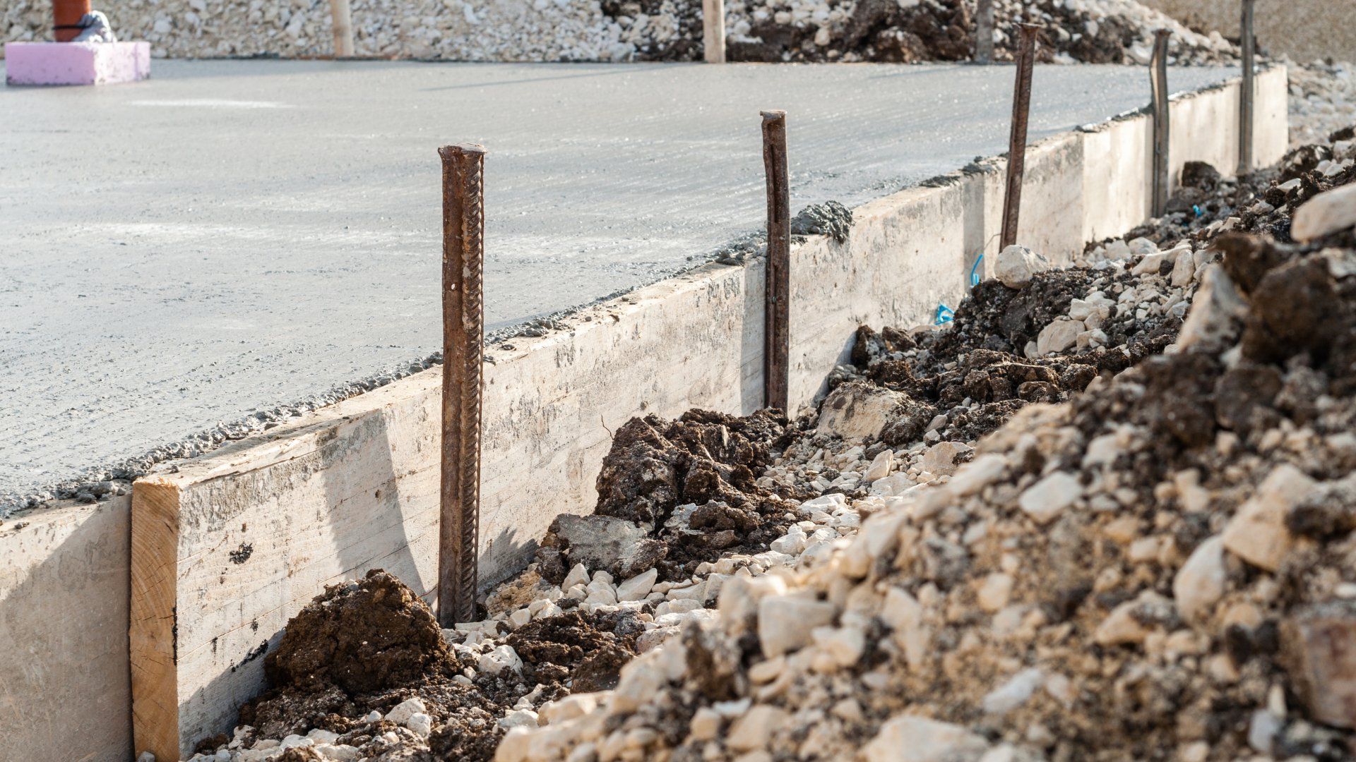Closeup picture of a concrete slab on grade being installed in Peterborough.