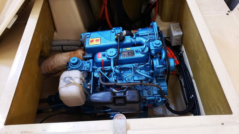 A Blue Engine is Sitting Inside of a Boat — Whitsunday Diesel & Marine In Rockhampton, QLD