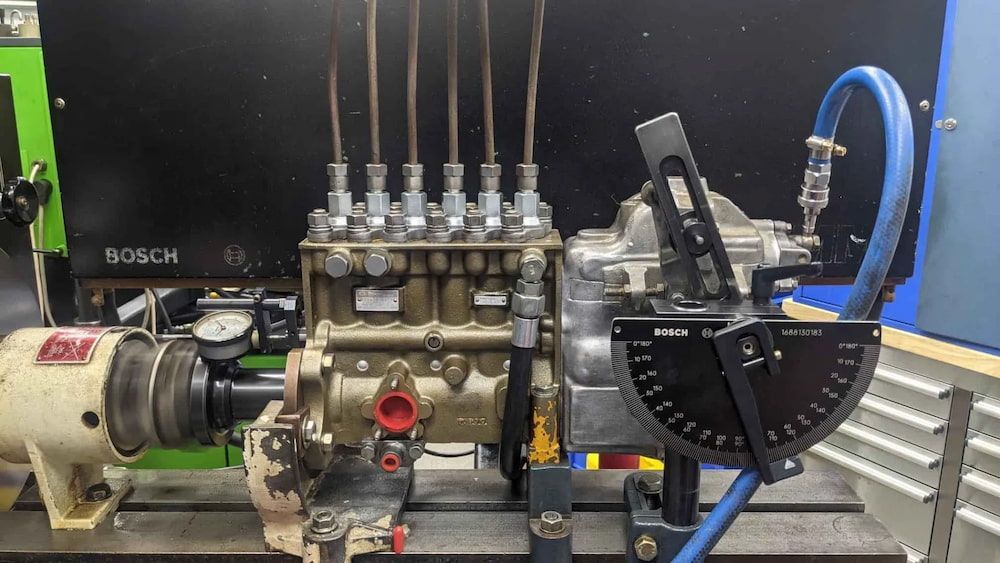 A Diesel Engine is Being Tested on a Machine in a Lab — Whitsunday Diesel & Marine In Jubilee Pocket, QLD