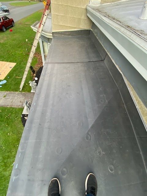 Get flat roofing services in Vernon, NY with Wilson Roofing & Contracting