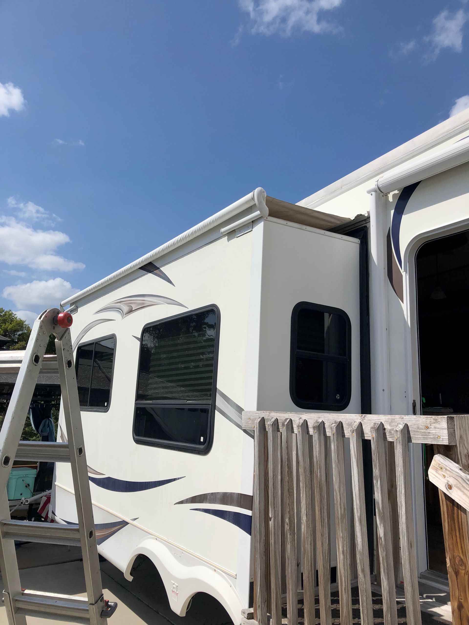Happy Couple with RV — Fort Myers, FL — RV Doctor Inc. Happy Couple with RV — Fort Myers, FL — RV Doctor Inc.
