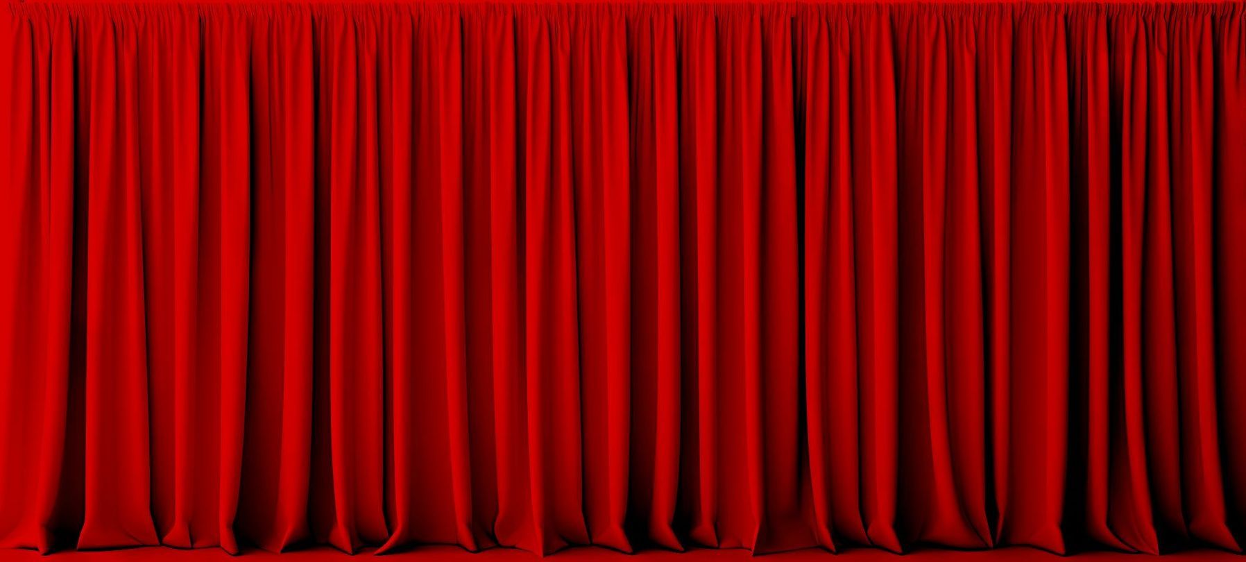 A close up of a red curtain on a stage.