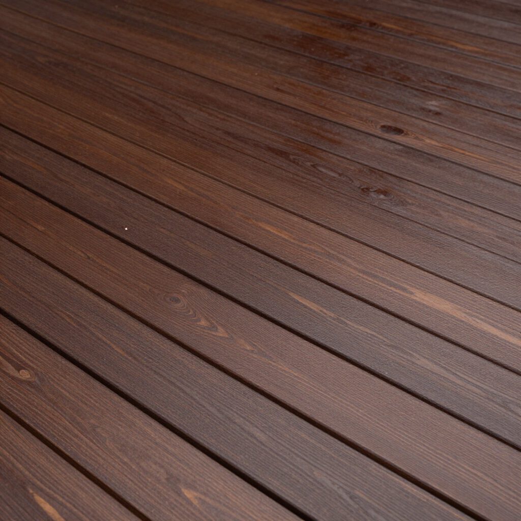 Close-up of brown wooden deck planks with visible grain and diagonal lines