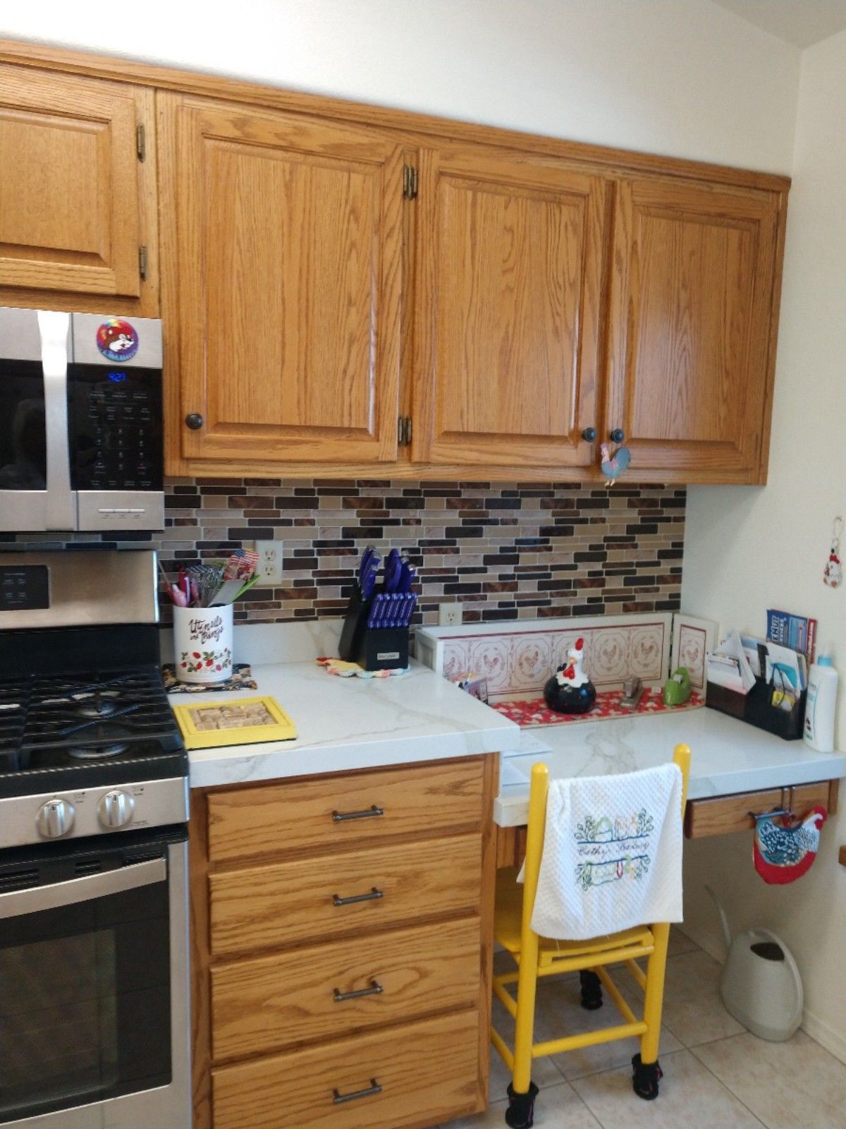 Second cabinet run in the same Calhan kitchen used to compare the written cabinet scope