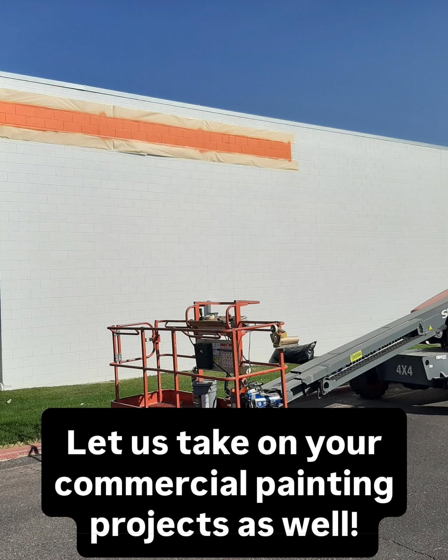 Commercial masonry wall with masking and access equipment during painting in Carroll’s published commercial gallery