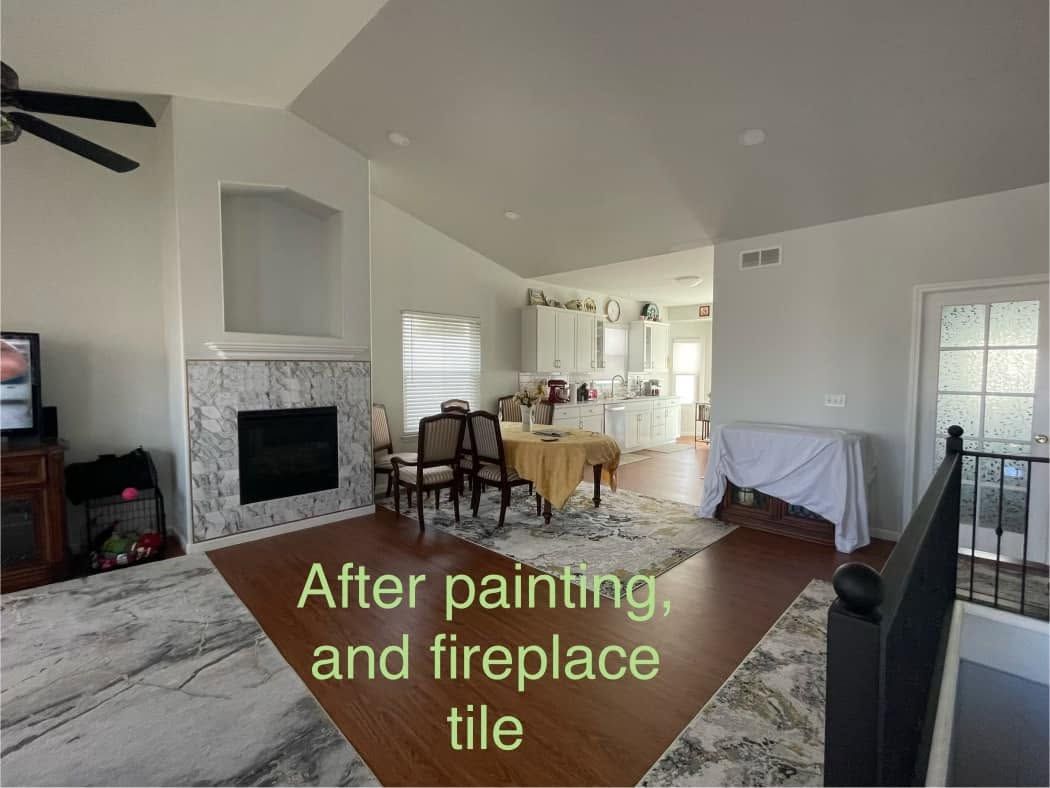 The same living room with lighter walls after Carroll Painting's repaint