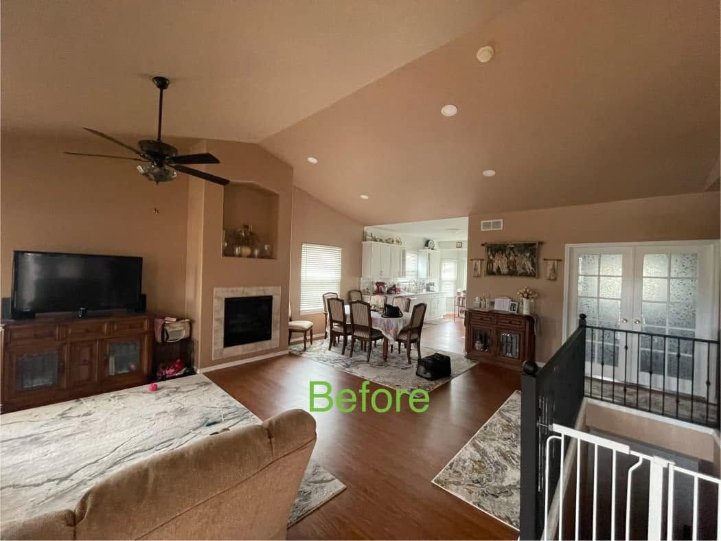 Living room with brown walls before Carroll Painting's interior repaint