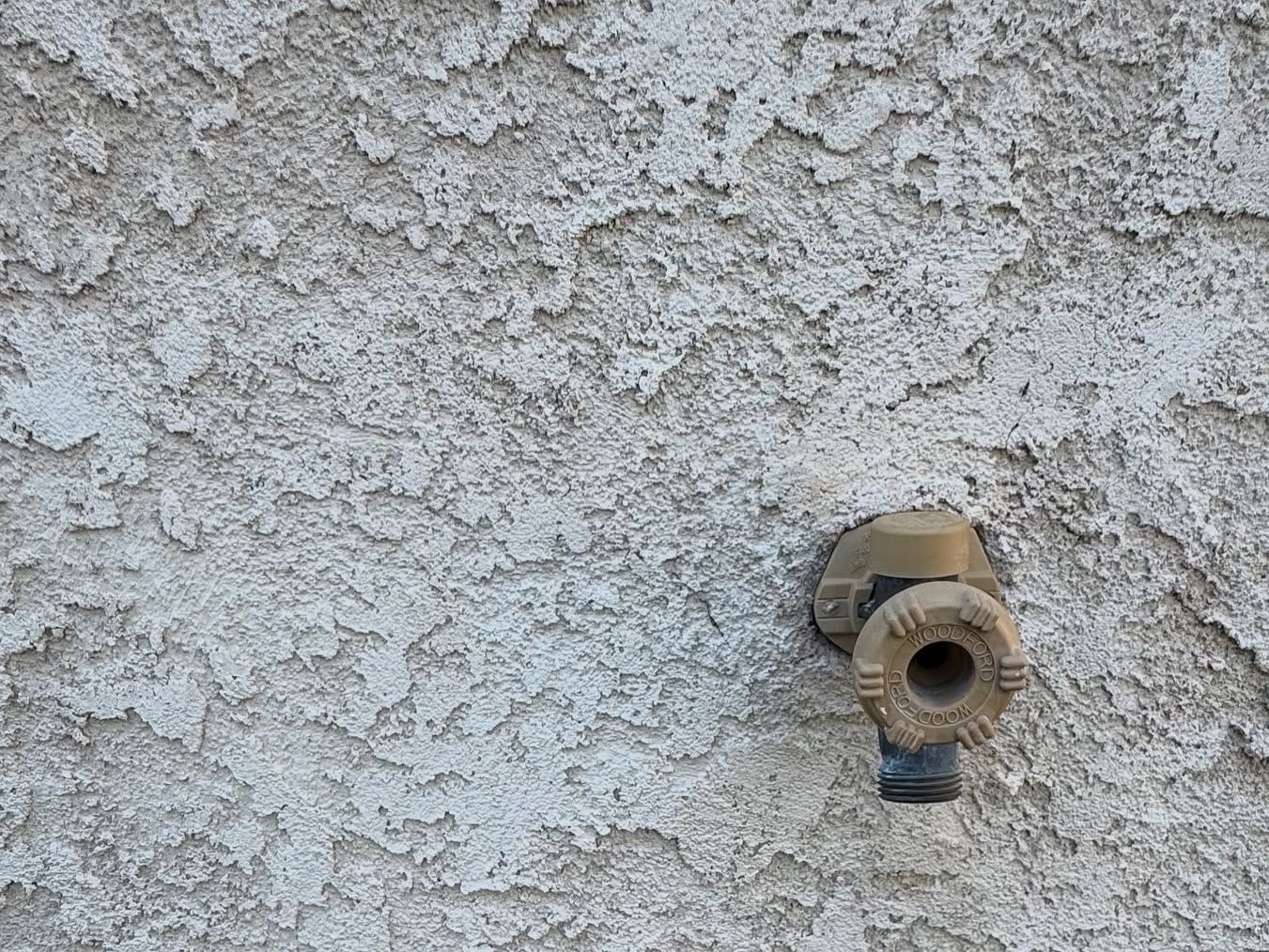 Stucco detail before work in Carroll Painting's project library
