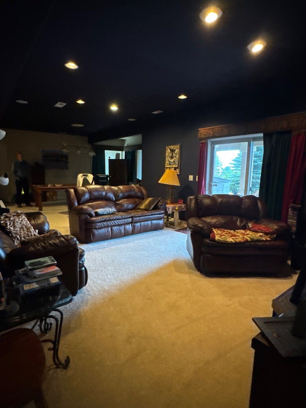 Furnished basement with existing wall and ceiling finishes in a Colorado Springs estimate