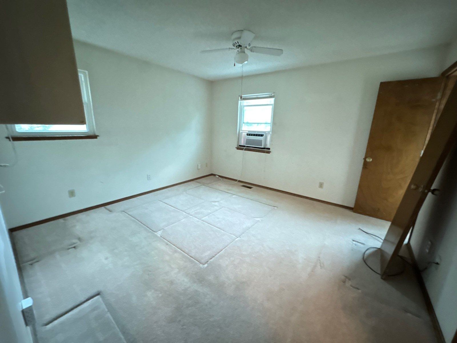 Bedroom walls, ceiling and existing wood trim in the same Colorado Springs estimate