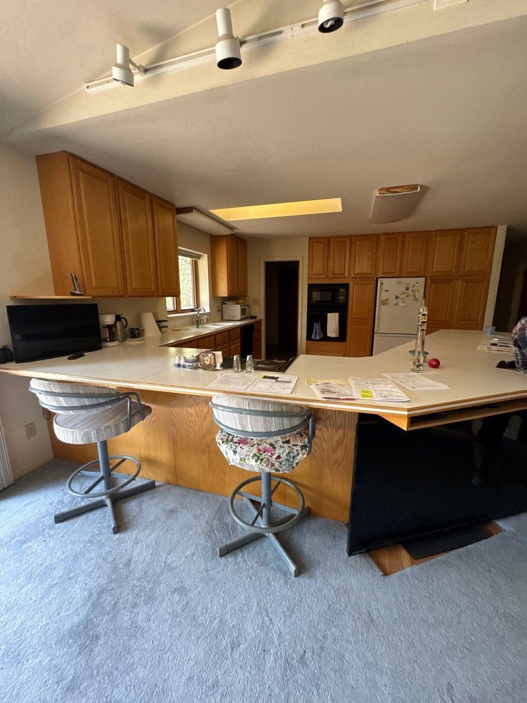 Kitchen and connected living-area ceiling in a Colorado Springs estimate with separate wall options