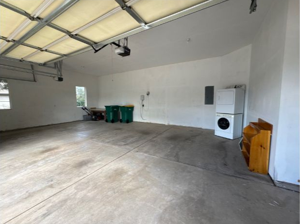 Garage walls, ceiling and stored household items photographed for the same Colorado Springs estimate