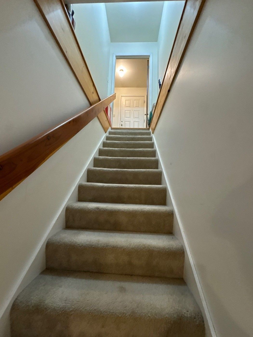 Basement stairwell photographed in the same Colorado Springs interior estimate