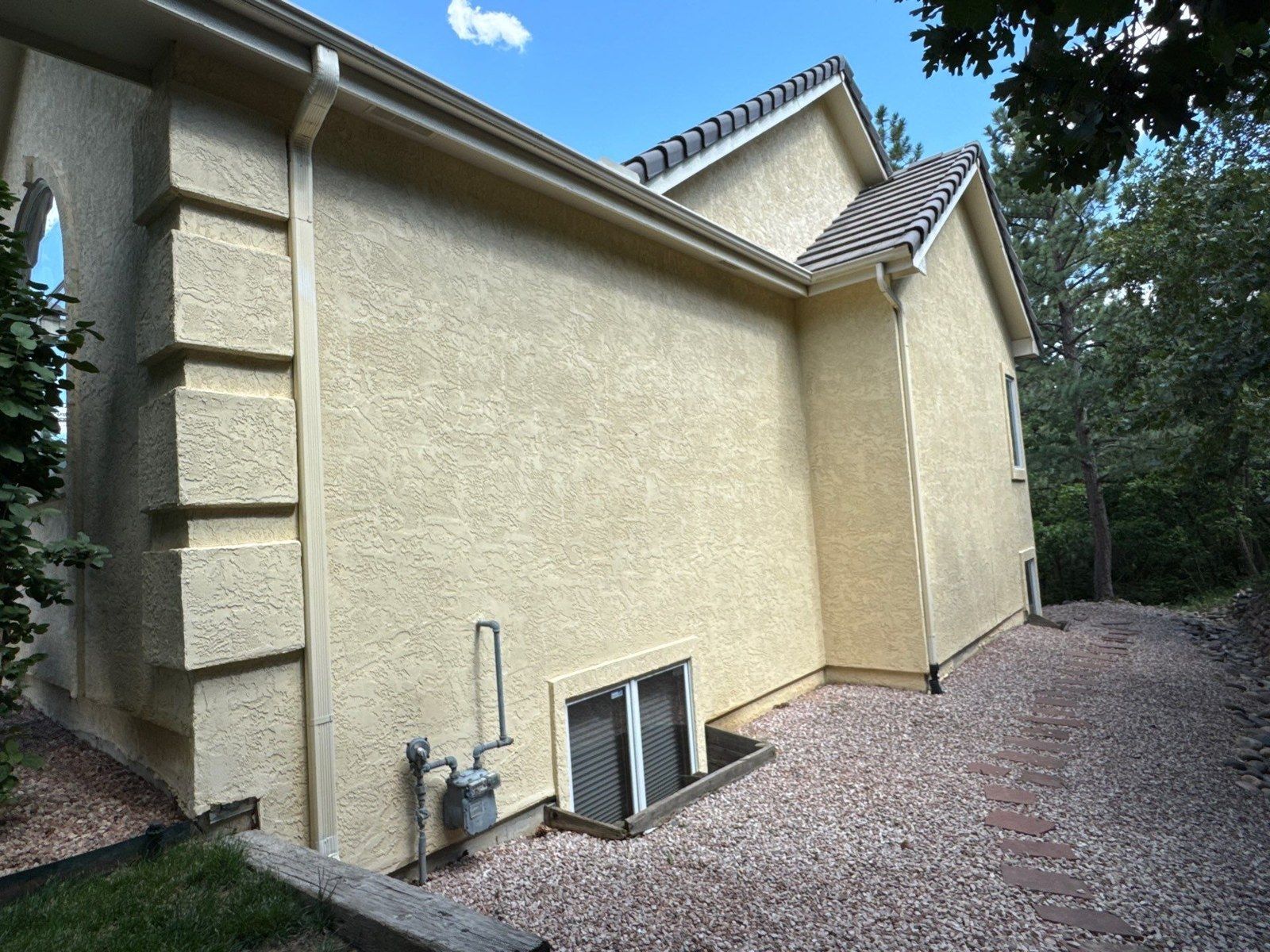 Stucco elevations, windows, fascia and gutters on the Colorado Springs house