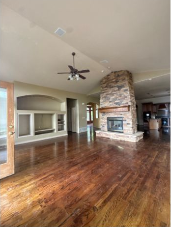 Living area, ceiling, openings and masonry feature in a Colorado Springs interior estimate