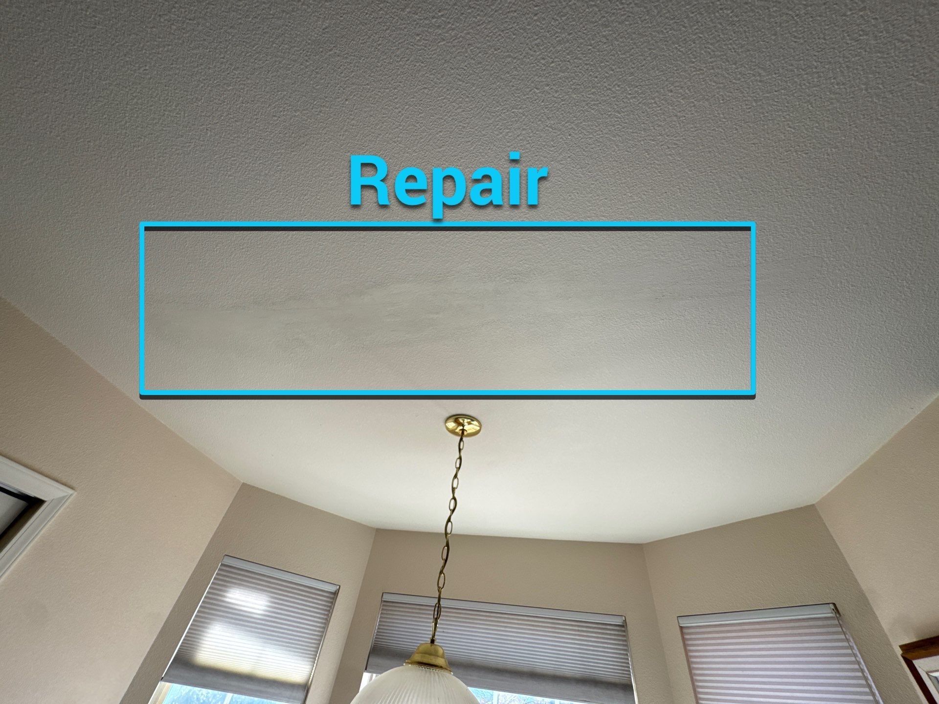 Kitchen ceiling photograph from the Colorado Springs estimate with the proposed repair area marked