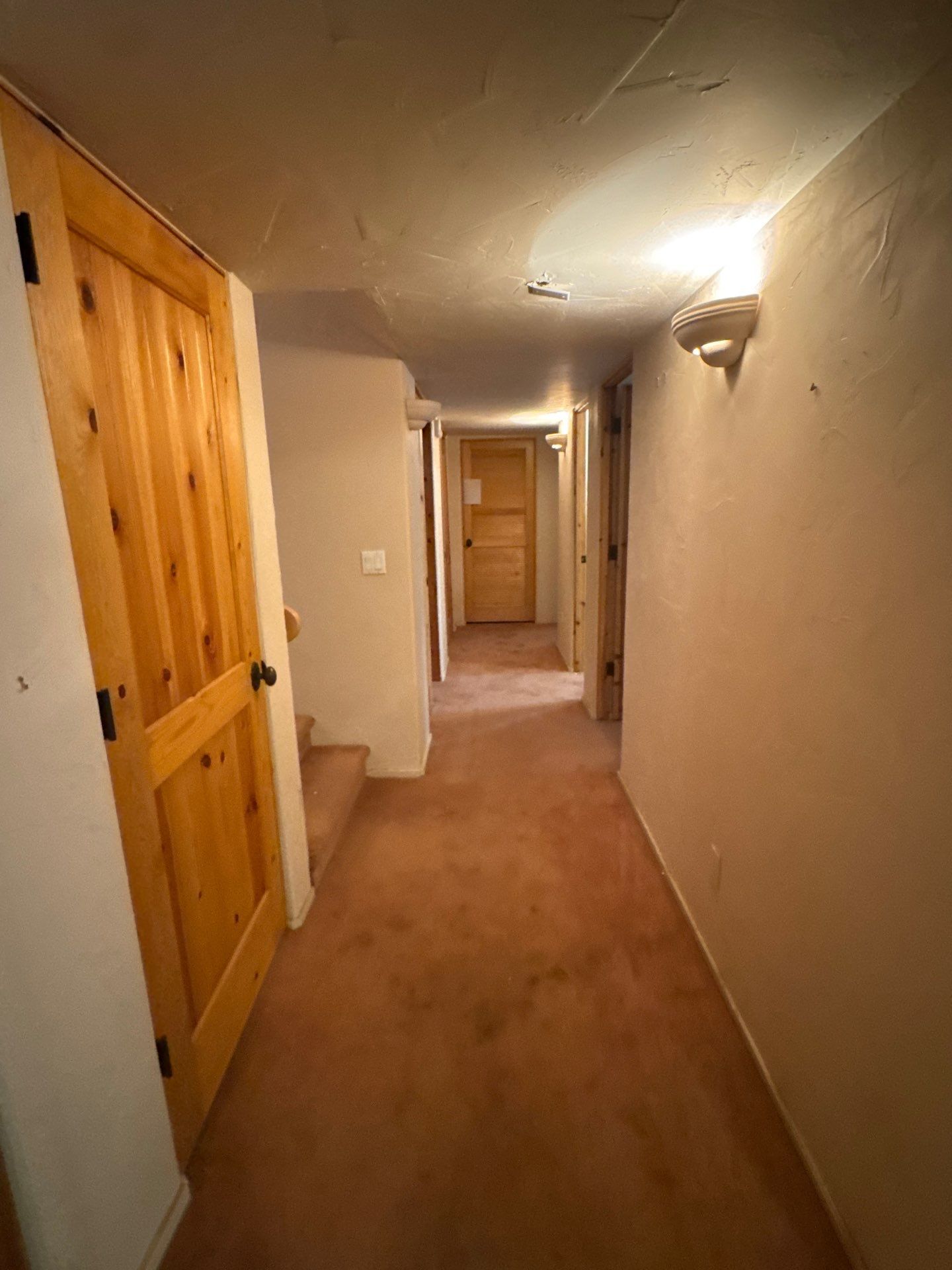 Existing hallway and wood doorways in the same Colorado Springs interior estimate