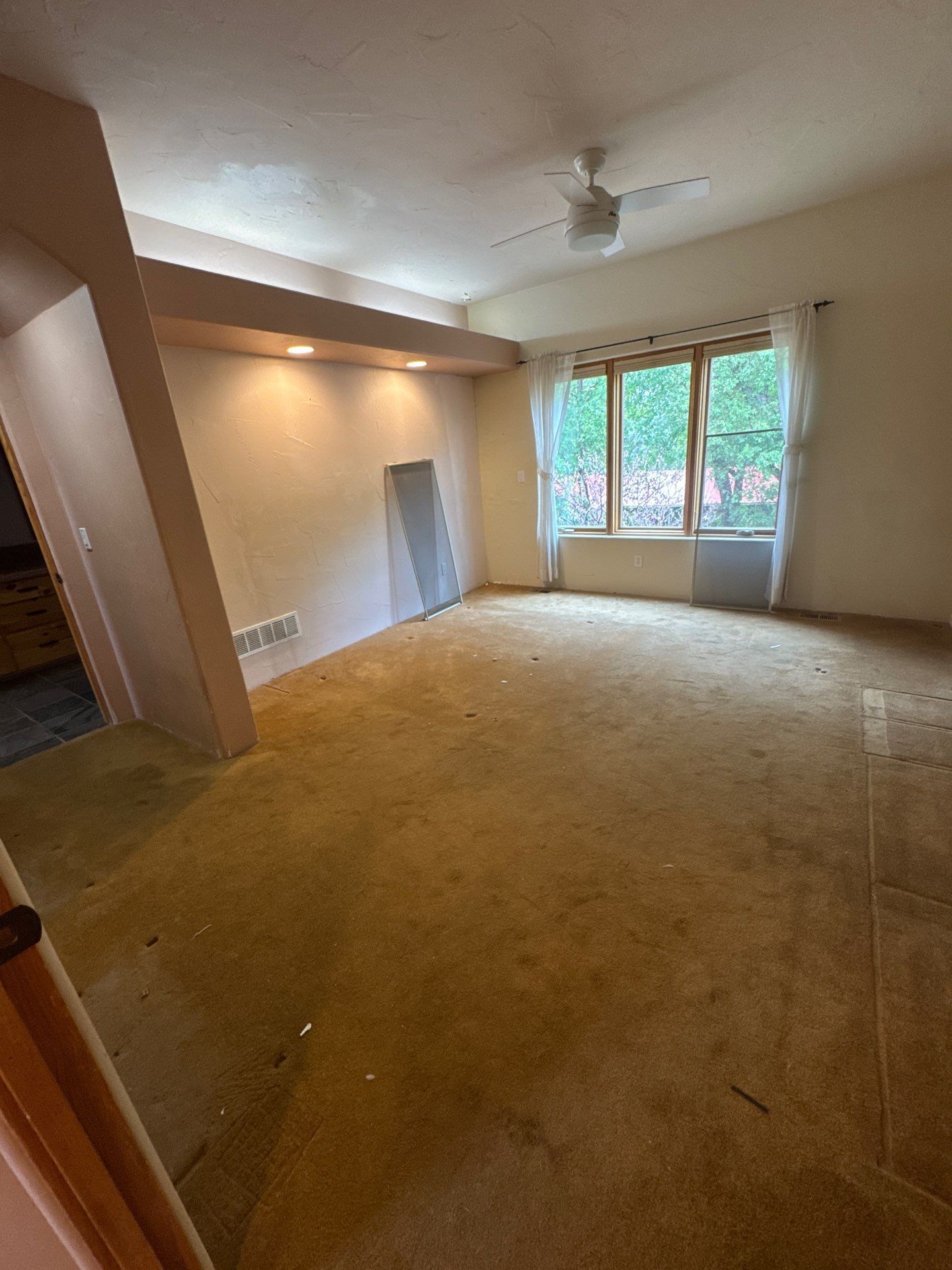 Existing Colorado Springs interior room attached to the estimate separating painting and door replacement